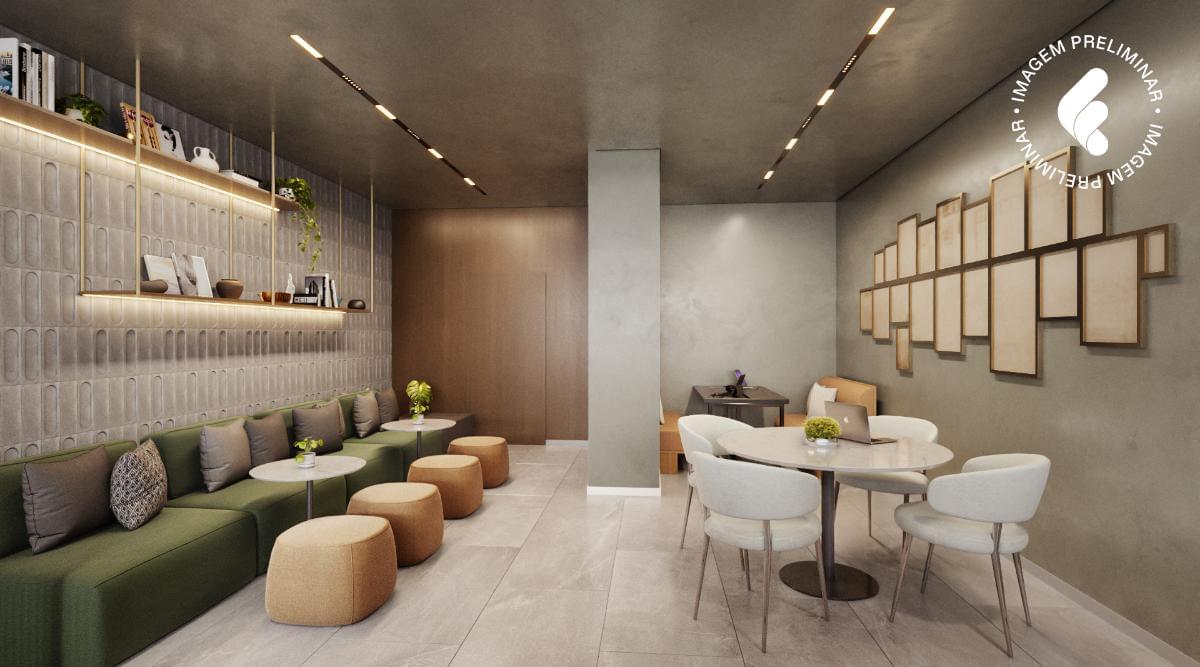 Coworking do 145 Vianna com mesas, poltronas e iluminação acolhedora