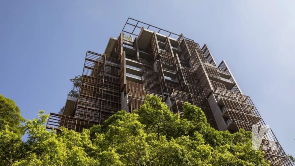 Fachada Moderna E Sustentável Do Rosewood São Paulo, Rodeada Por Árvores.