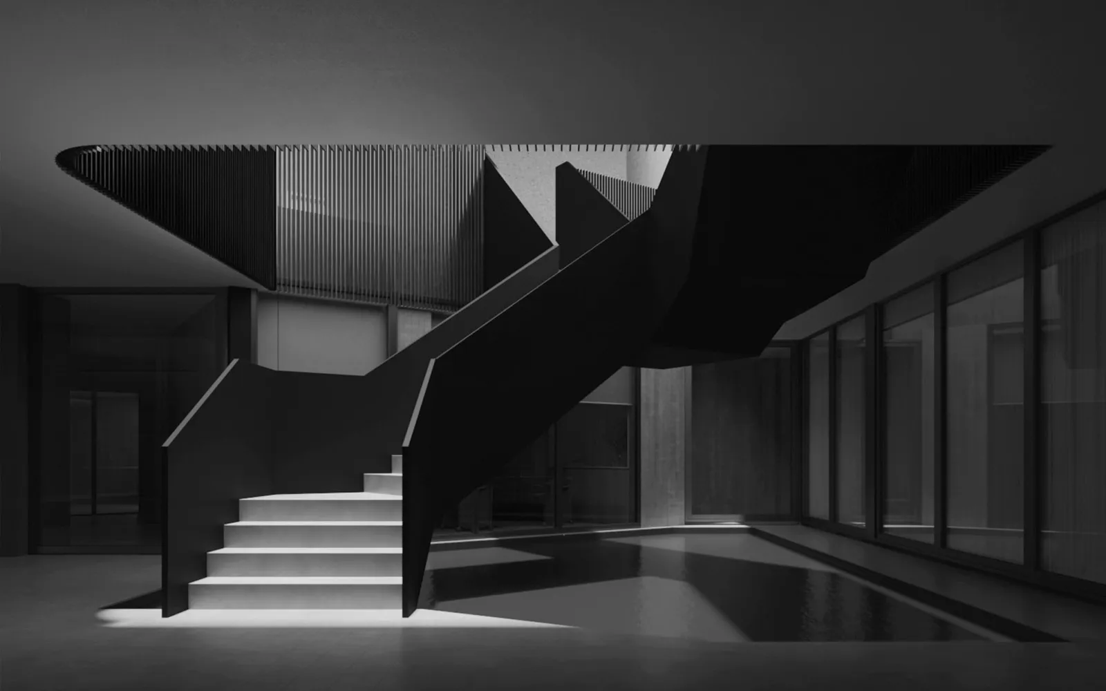 Escada moderna com design geométrico no ambiente multiuso do Enora Residence