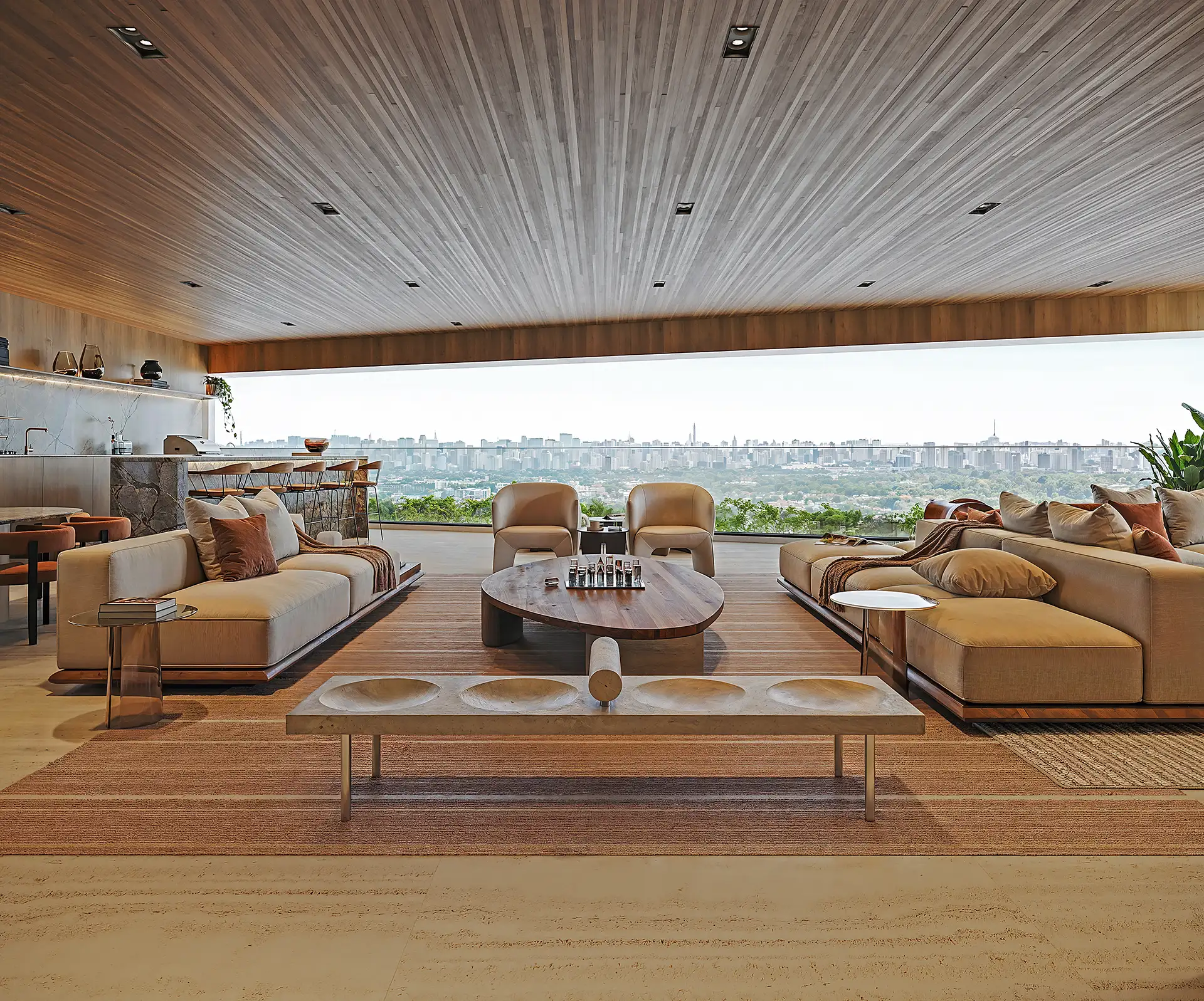 LUX 600 — living integrado com cozinha e vista panorâmica de São Paulo — curadoria iApartamentos — Vila Nova Conceição