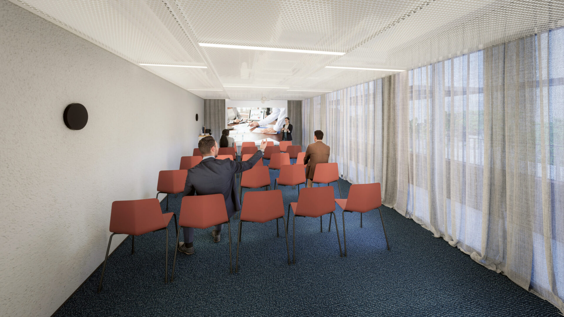 Sala de reuniões e eventos do Praça Japi com cadeiras e telão para apresentações