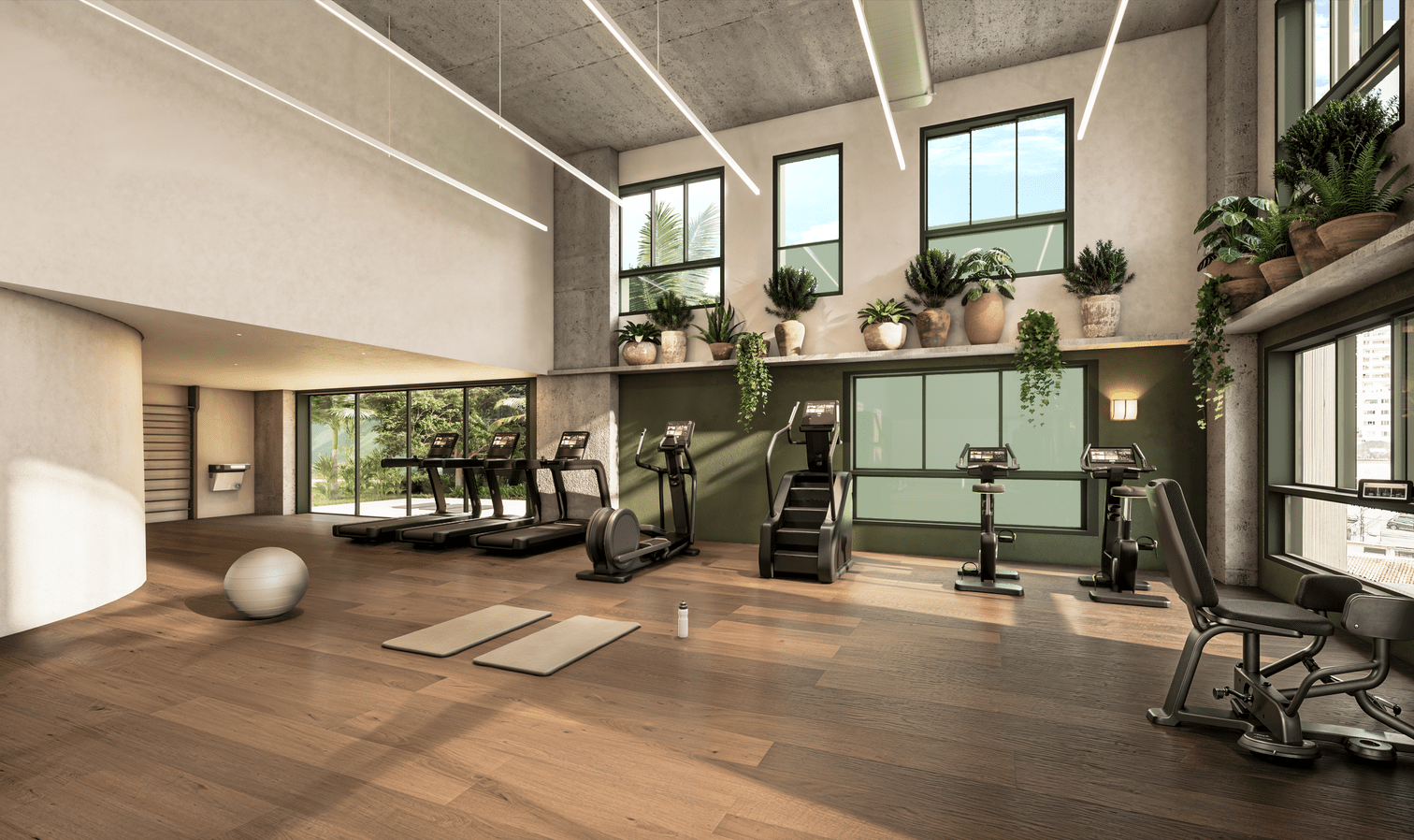Samanea Pinheiros — Academia com área de cardio e pé-direito duplo — curadoria iApartamentos — Pinheiros
