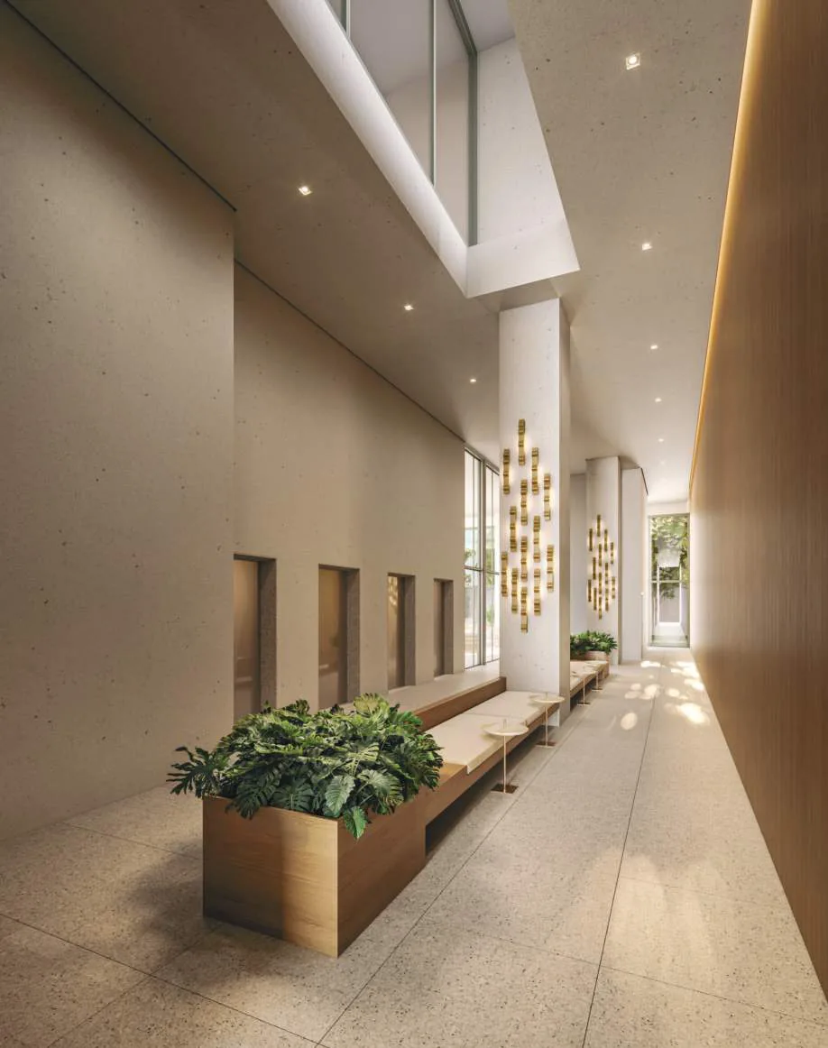 Edifício Paulistano, lobby com pé-direito alto, bancos em madeira e jardineira, curadoria iApartamentos, Jardins