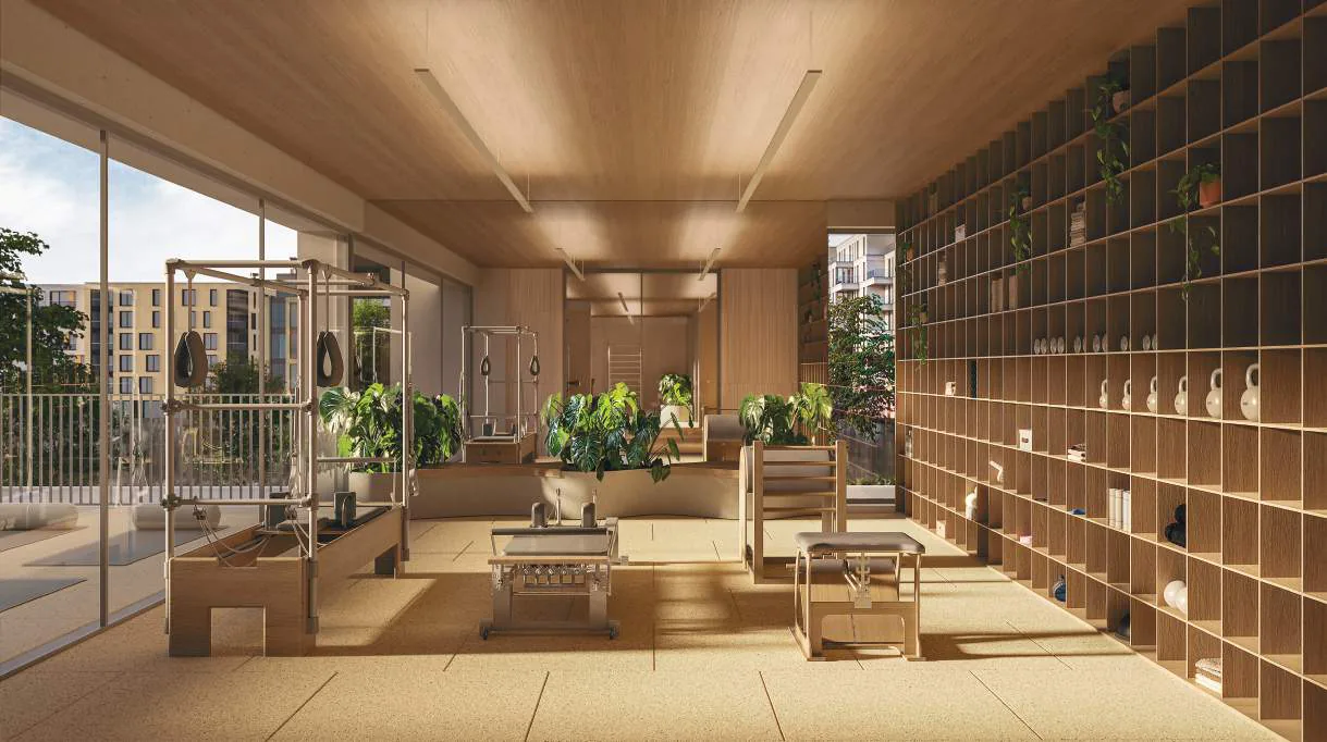 Edifício Paulistano, espaço de pilates com aparelhos e integração com yoga externo, curadoria iApartamentos, Jardins
