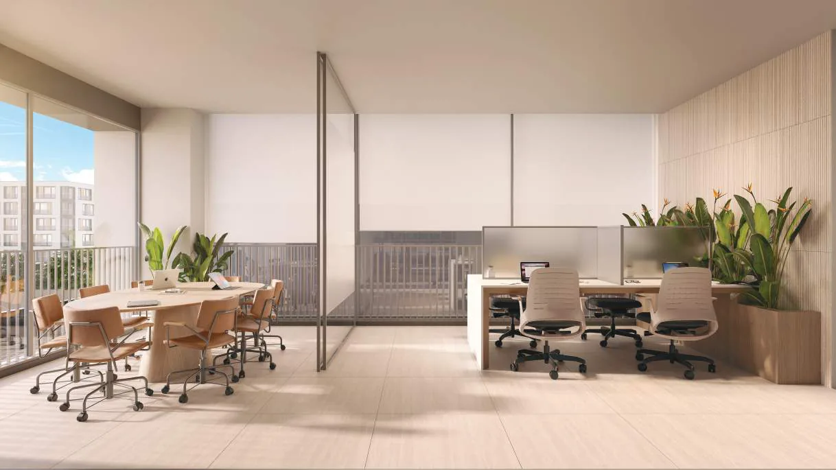 Edifício Paulistano, coworking com mesa de reunião e estações de trabalho, curadoria iApartamentos, Jardins