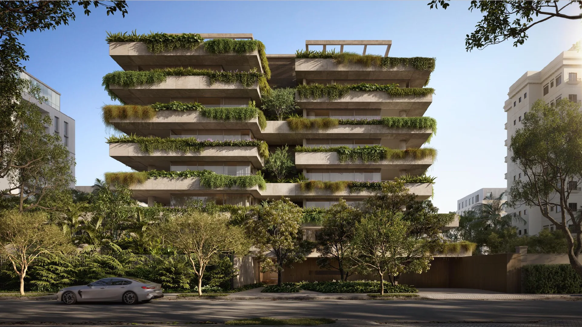 Edifício Primavera, fachada frontal com varandas jardineiras em concreto e paisagismo na Rua Primavera, curadoria iApartamentos, Jardim Paulista