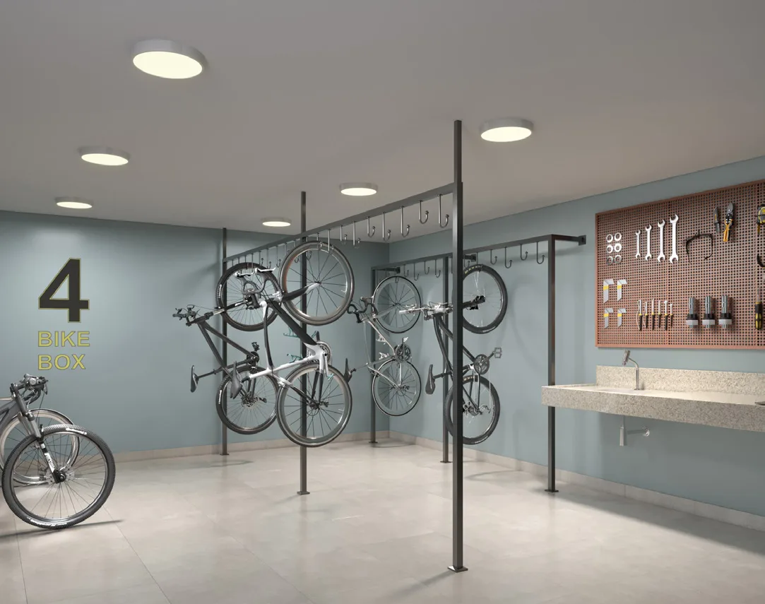 Terrare Moema, bicicletário com bike box e bancada de manutenção, curadoria iApartamentos, Moema
